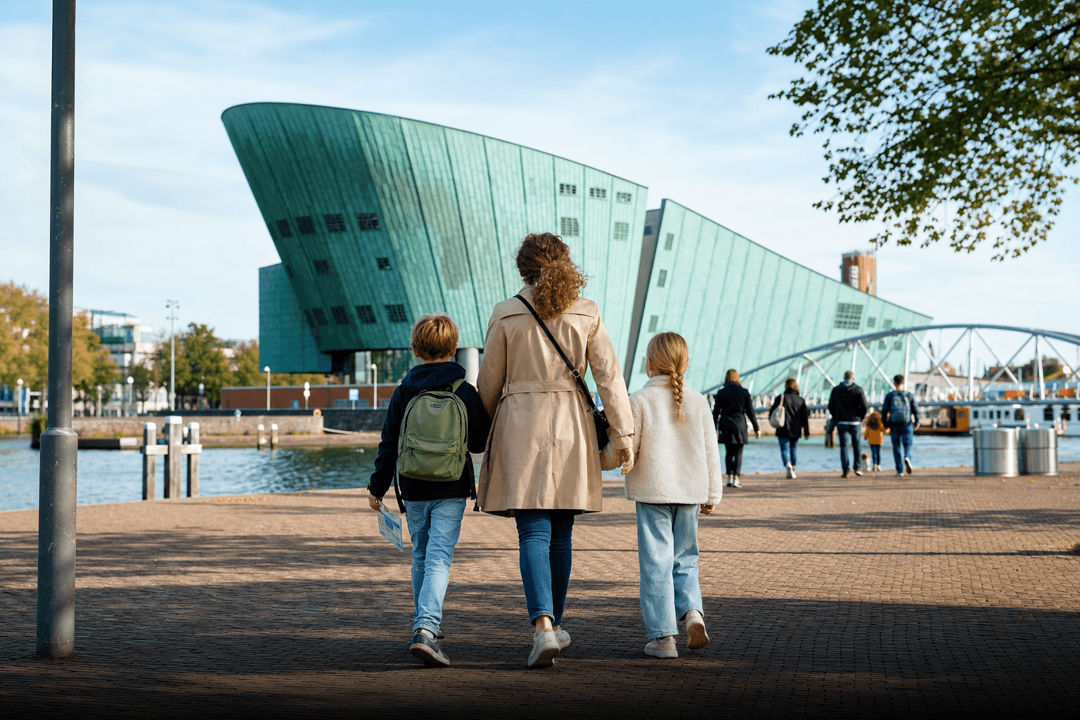 Family arriving at a waterfront science museum